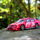 Illustration for article titled Celebratory Kyosho DTM Alfa Romeo 155 V6